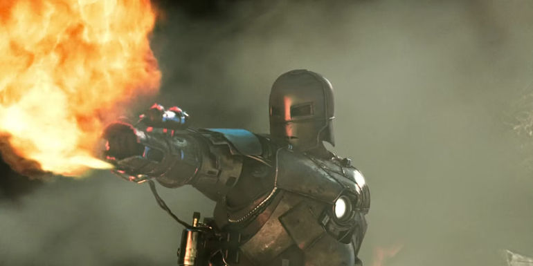 Robert Downey Jr. as Tony Stark wearing the Mk.I suit and using a flamethrower in Iron Man (2008)