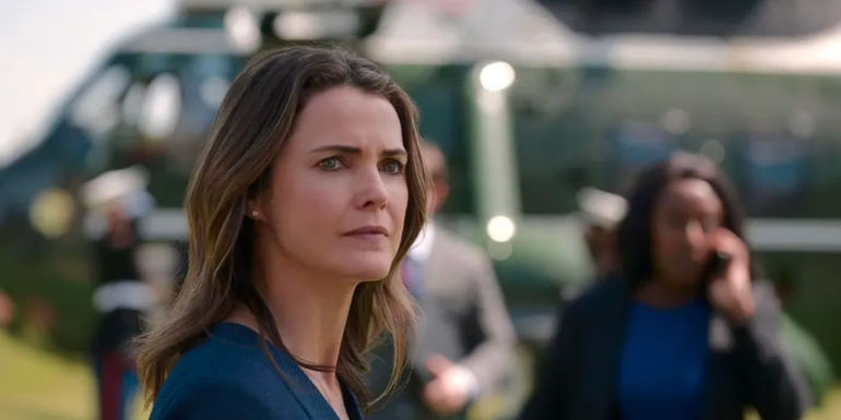 A woman from The Diplomat is looking into the distance. 