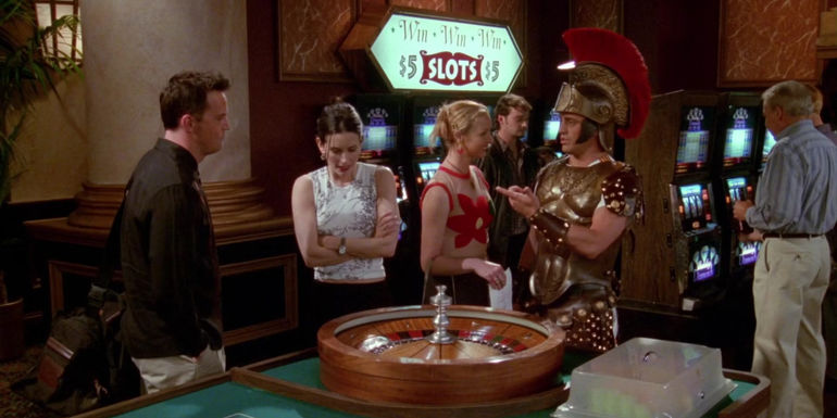 Chandler, Monica, Phoebe, and Joey by a roulette table in Vegas Friends Season 5