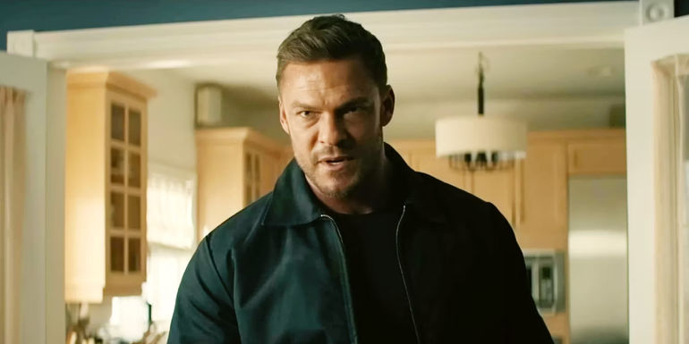 Alan Ritchson looking serious as Jack Reacher in Reacher