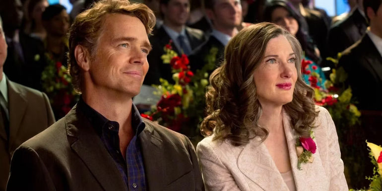 Jonathan and Martha Kent watch proudly in Smallville