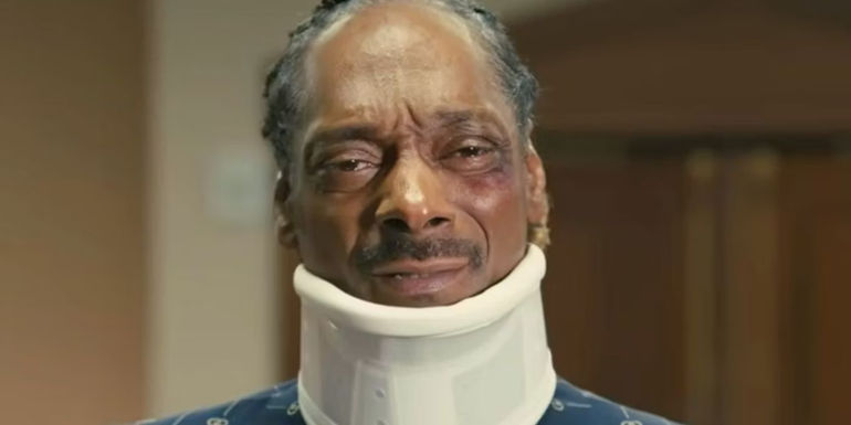 Snoop Dogg as Jaycen JJ Jennings dressed in injuries in The Underdoggs.