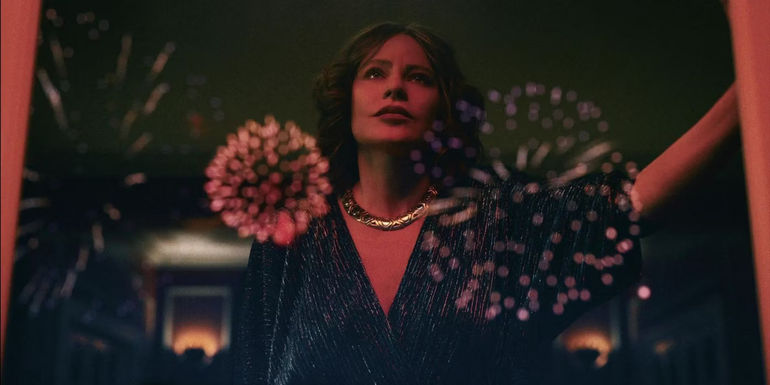 Sofía Vergara as Griselda Blanco admires fireworks in a scene from Griselda.