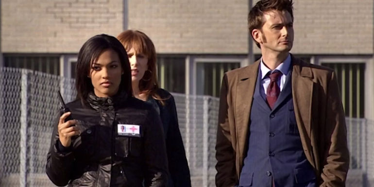 Doctor Who's Martha Jones (Freema Agyeman) walks, followed by Ten (David Tennant) and Donna Noble (Catherine Tate)
