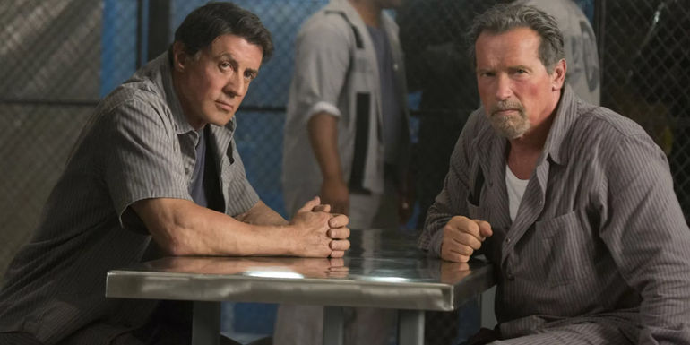 Sylvester Stallone and Arnold Schwarzenegger in a prison cafeteria in Escape Plan