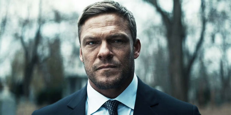 Alan Ritchson looking serious as Jack Reacher in Reacher season 2