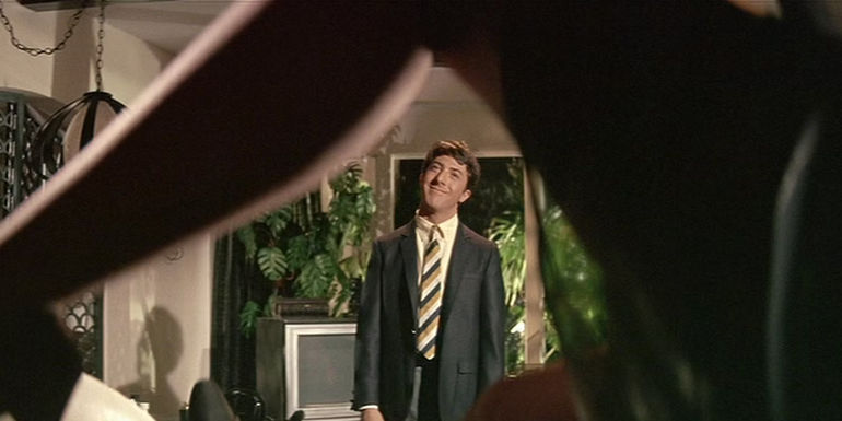 Benjamin looks at Mrs. Robinson in The Graduate