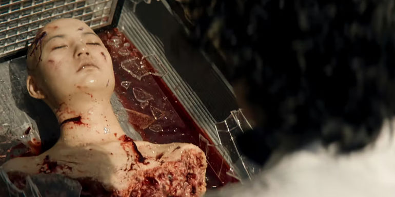 Dr. Yang looking at the remaining parts of his daughter in Badland Hunters' ending