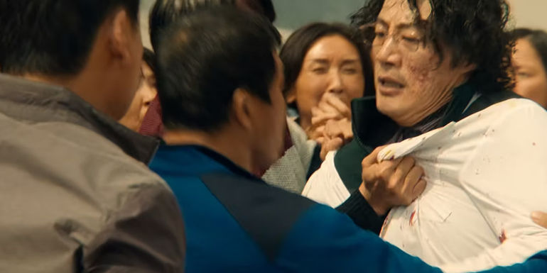 Several people surrounding Dr. Yang in Badland Hunters