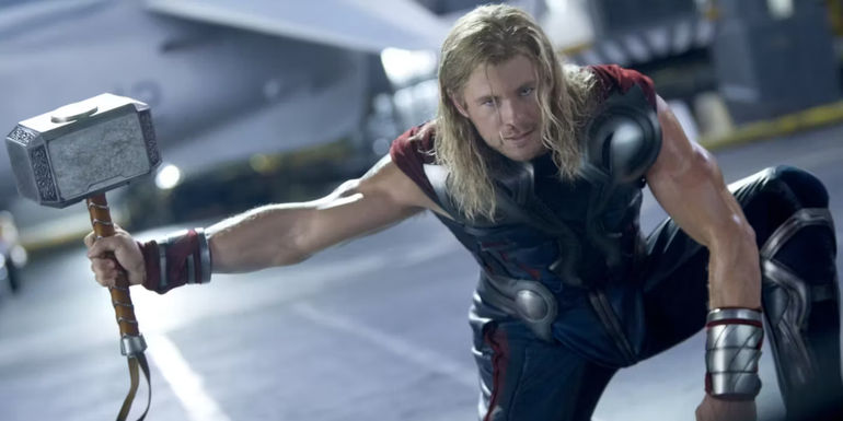 Thor with Mjolnir from Avengers preparing to strike Hulk