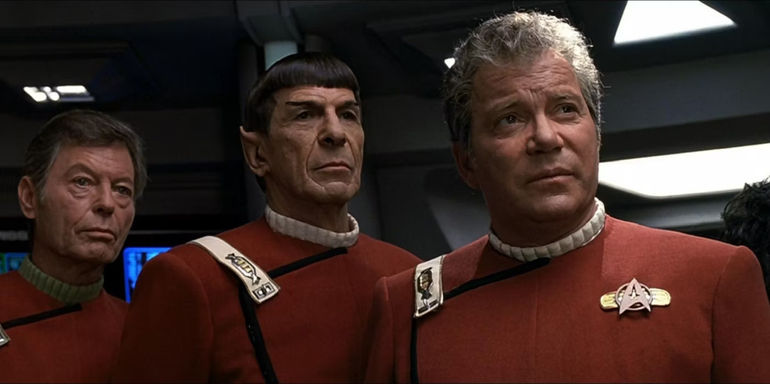 Kirk, Spock, and McCoy look on from Star Trek VI