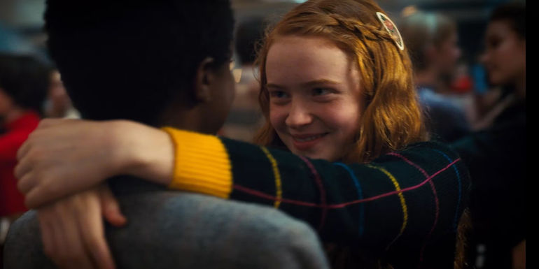 Lucas Sinclair (Caleb McLaughlin) and Max Mayfield (Sadie Sink) dance together in Stranger Things season 2 finale.