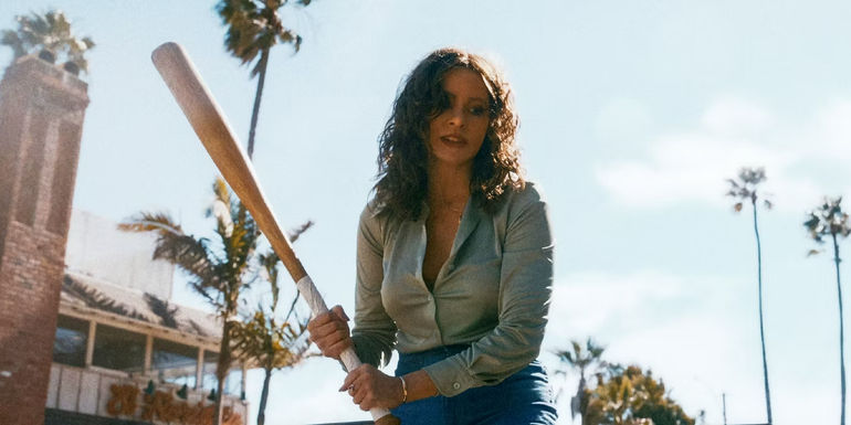 Sofia Vergara as Griselda menacingly holds a bat in Griselda.