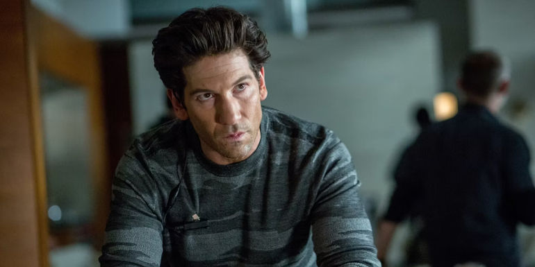 Jon Bernthal looks on in The Accountant 