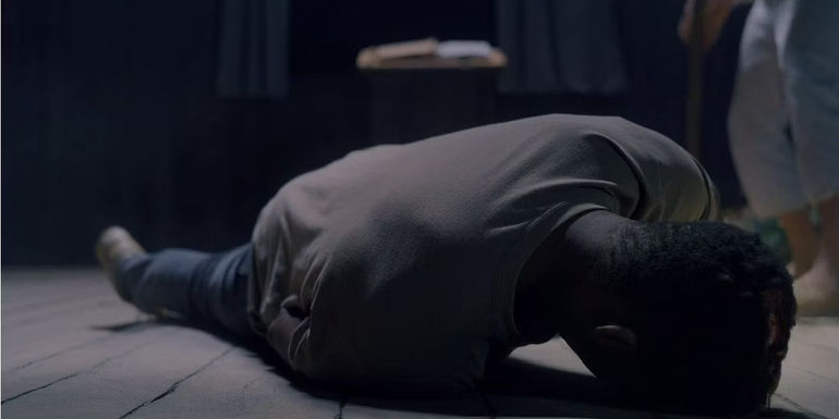 Josh on the floor in Midsommar