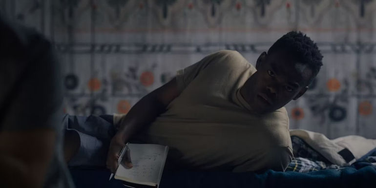 Josh in bed in Midsommar