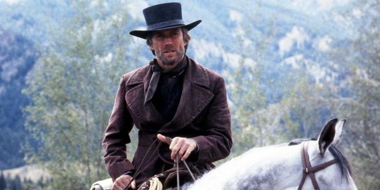 Preacher on a white horse in Pale Rider