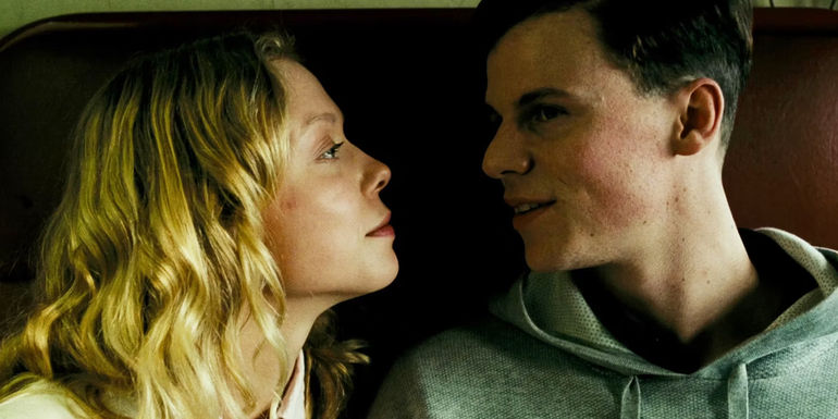 The Postcard Killings Sylvia and Mac on the train talking