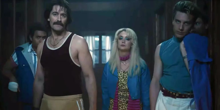 Trevor (Matthew Morrison), Montana (Billie Lourd), and Xavier (Cody Fern) standing together in AHS 1984.