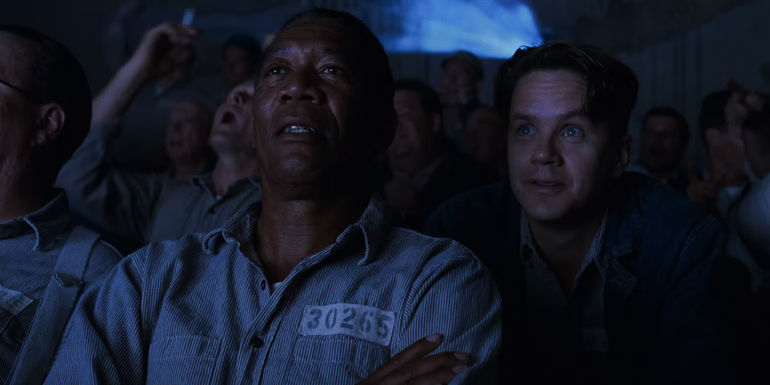Andy and Red watching a movie in The Shawshank Redemption