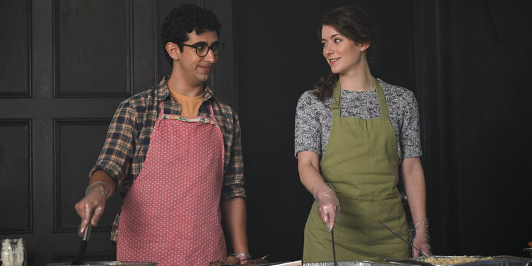  Arash DeMaxi as Rizwan and Molly Kunz as Phoebe smiling at each other in The Irrational 108.