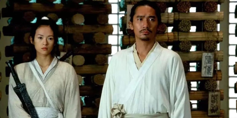 Moon and Broken Sword standing next to one another 