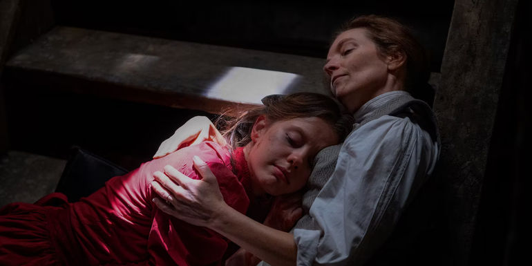 Pearl hugging her mother.