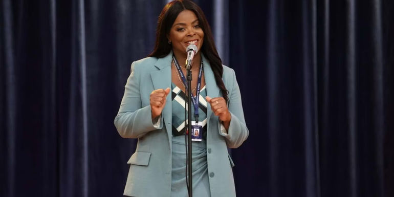 Principal Ava speaking into a mic in Abbott Elementary