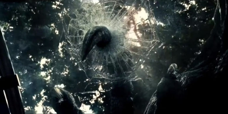 The Indominus Rex smashes through a gyrosphere in Jurassic World