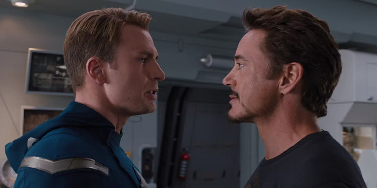 Chris Evans as Captain America arguing with Robert Downey Jr. as Tony Stark in The Avengers (2012)