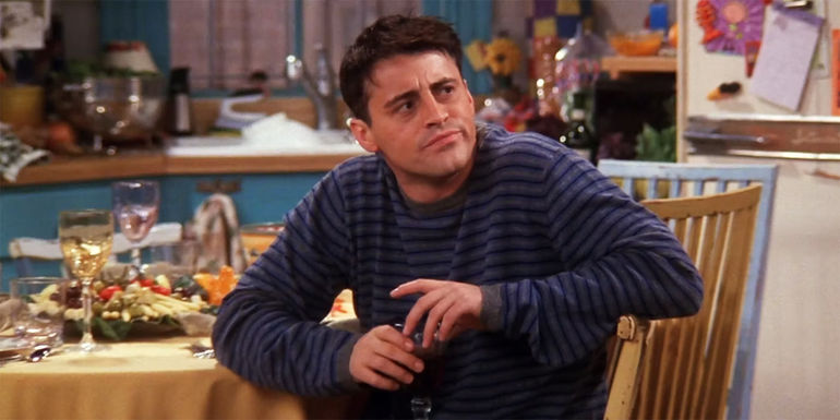 Joey (Matt LeBlanc) Sitting at the Table Looking Disappointed in Friends