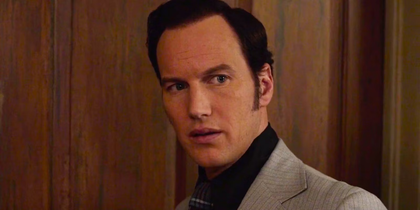 Ed Warren looking concerned in The Conjuring