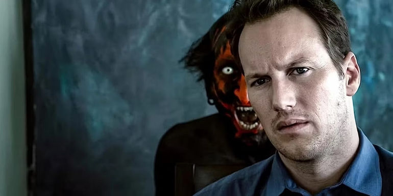 The demon appears behind Patrick Wilson in Insidious