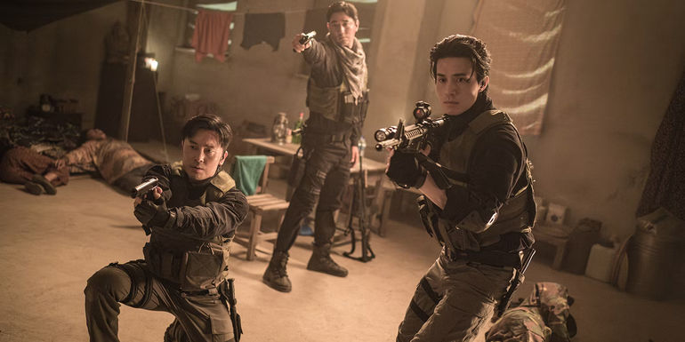 Jinman and soldiers holding guns after attack in A Shop For Killers episode 6