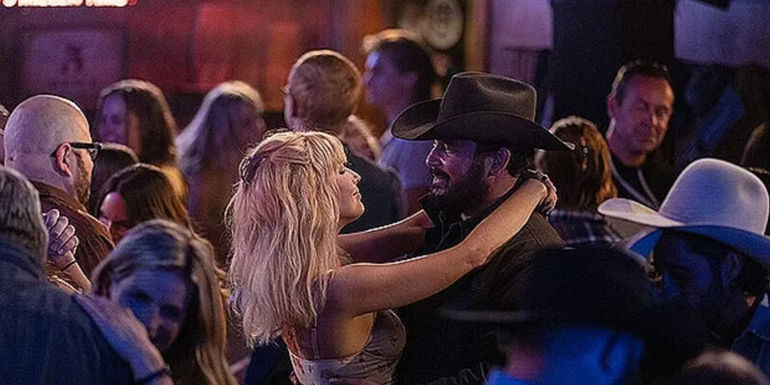 Beth (Kelly Reilly) and Rip (Cole Hauser) dancing in Yellowstone