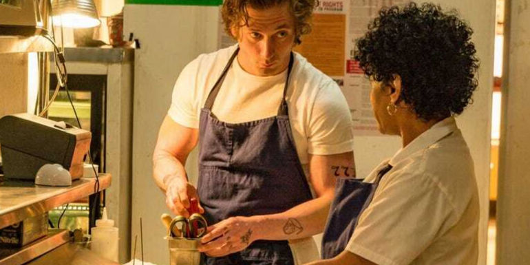 Carmy talking to one of the employees in The Bear