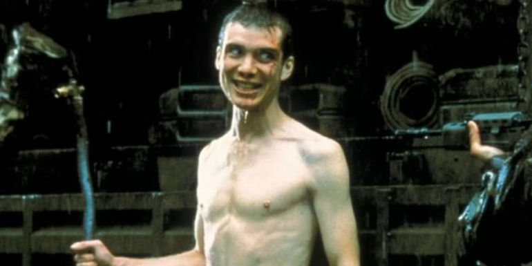 Cillian Murphy as Jim holding an iron bar in 28 Days Later.