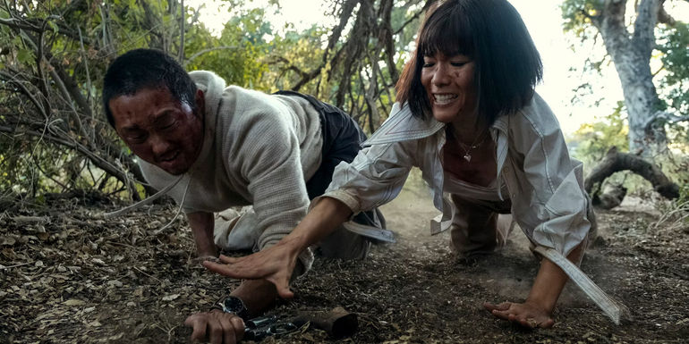 Danny and Amy fighting for a gun in Beef