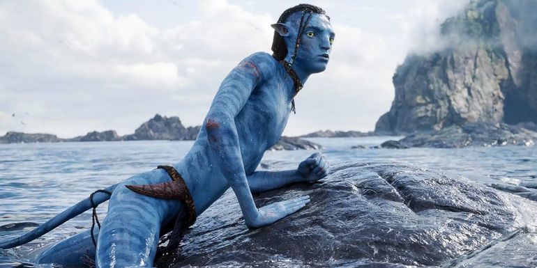 Lo’ak laying on a rock in Avatar 2: The Way of Water.