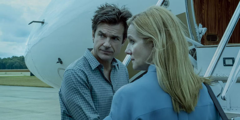 Jason Bateman and Laura Linney as Marty and Wendy Byrde getting on a plane in Ozark