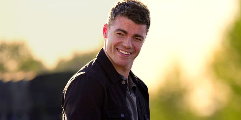 Gabriel Basso as Peter Sutherland Smiling in The Night Agent Season 1