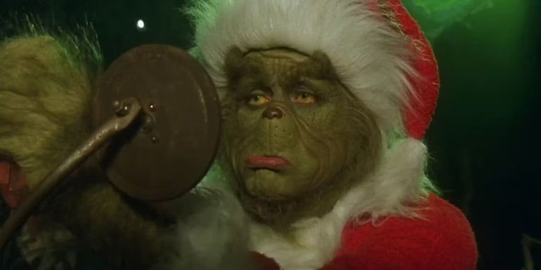 Grinch (Jim Carrey) looking sad in How the Grinch Stole Christmas.