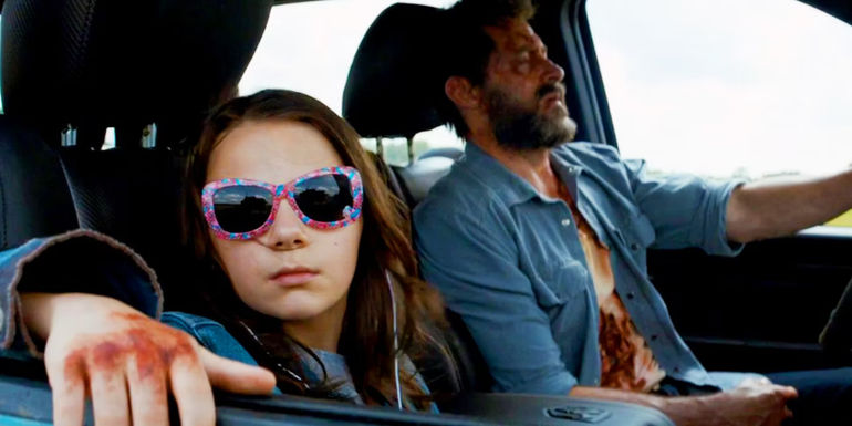 Wolverine and Laura driving in Logan