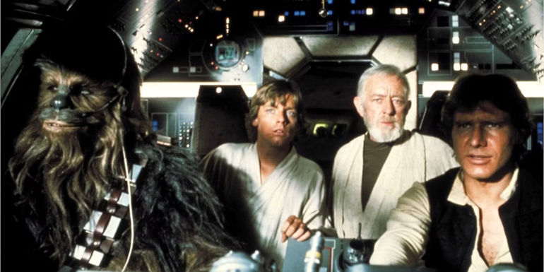Peter Mayhew as Chewbacca, Mark Hamill as Luke Skywalker, Alec Guinness as Obi-Wan Kenobi, and Harrison Ford as Han Solo inside the Millennium Falcon in Star Wars
