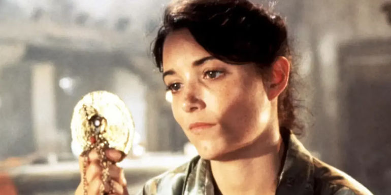 Marion Ravenwood looking at a trinket