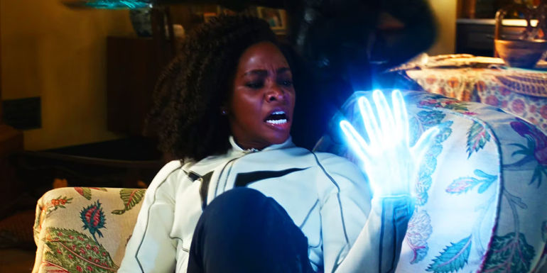 Monica Rambeau with a glowing hand in The Marvels