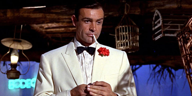 Sean Connery's James Bond smoking a cigarette in Goldfinger
