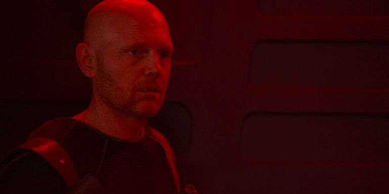 Bill Burr as Migs Mayfeld reacts to Qin's selfishness in The Mandalorian season 1, episode 6