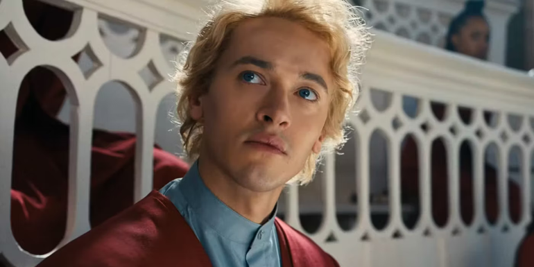 Tom Blyth's Coriolanus Snow in The Hunger Games: The Ballad Of Songbirds & Snakes is sitting in the Academy.