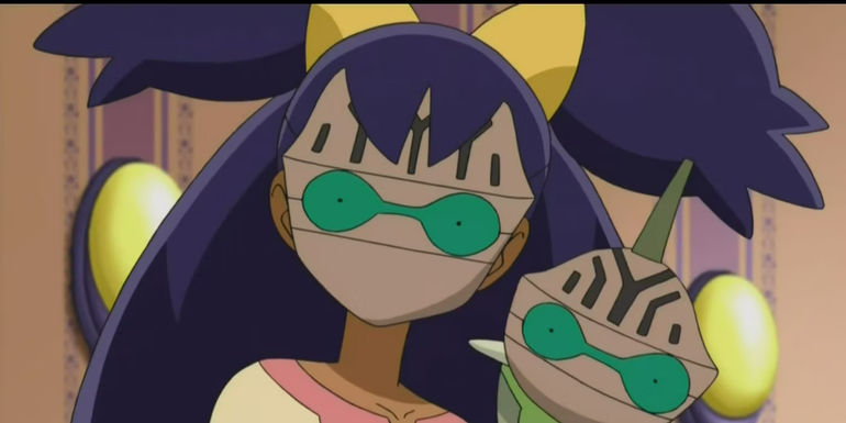 Pokemon: Iris and Axew have their faces replaced by Beheeyem's.